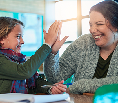 Regional partner high-fives student.